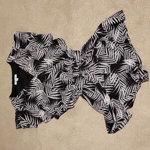 Ruffled Romper with belt and snap front closure